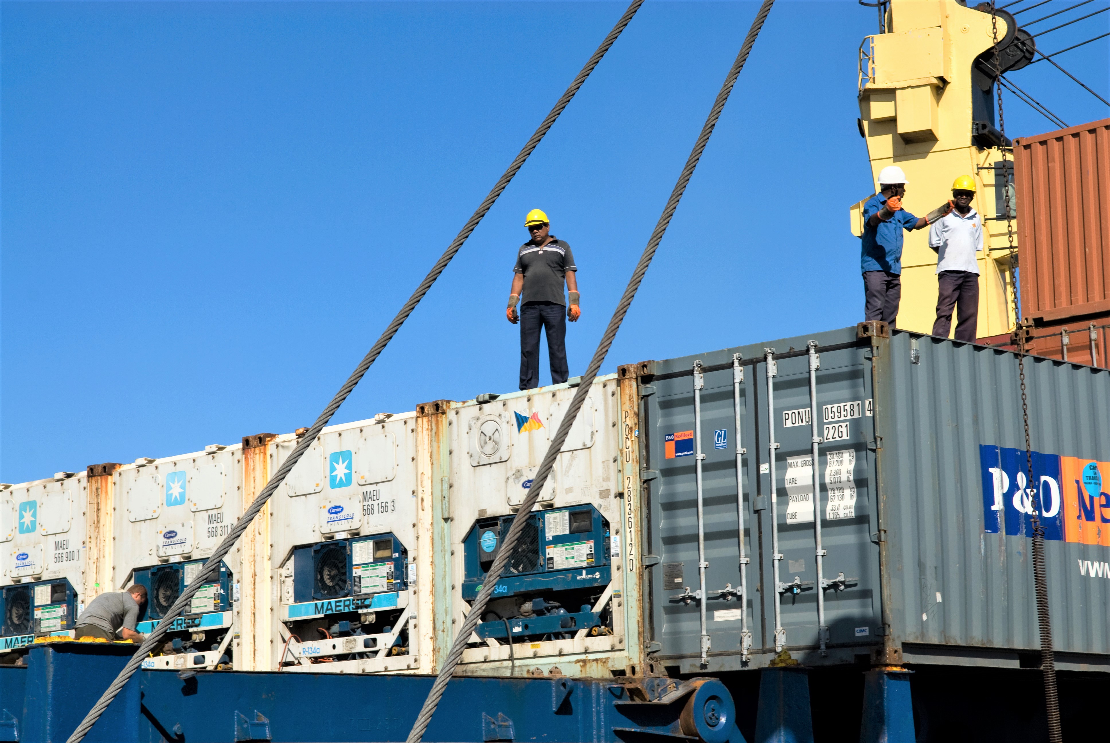 workers at port container terminal in Mauritius